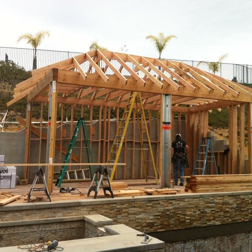 Worker doing room addition construction